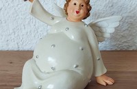 Dicker Engel mit Glocke